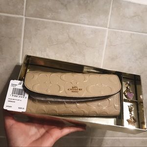 Coach Signature Debossed Patent Wallet Vanilla